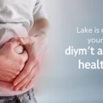Person with left abdomen pain, expressing discomfort.